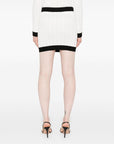 Balmain Balmain Button-embellished ribbed-knit mini skirt