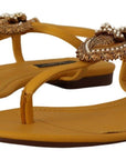 Dolce & Gabbana Mustard T-Strap Flat Sandals with Heart Embellishment