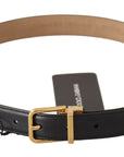 Dolce & Gabbana Elegant Black Leather Belt with Engraved Metal Buckle