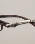Dolce & Gabbana Elegant Maroon Leather Belt with Engraved Buckle