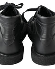 Dolce & Gabbana Elegant Ankle Boots with Silver Chain Detail