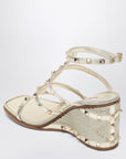 Valentino Garavani Valentino Garavani Rockstud wedge sandals in platinum color