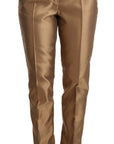 Dolce & Gabbana Elegant Tapered Silk Trousers in Gold