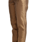 Dolce & Gabbana Elegant Tapered Silk Trousers in Gold