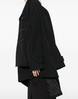 Comme Des Garcons Comme Des Garcons Complete with asymmetrical sleeves